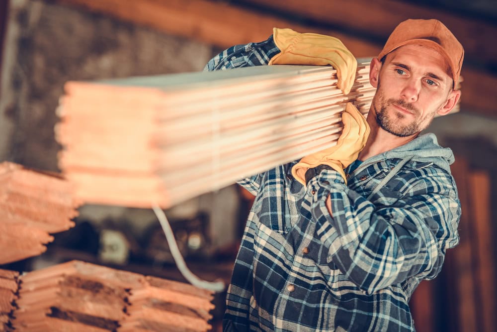 Stacks of lumber in a woodworking shop.